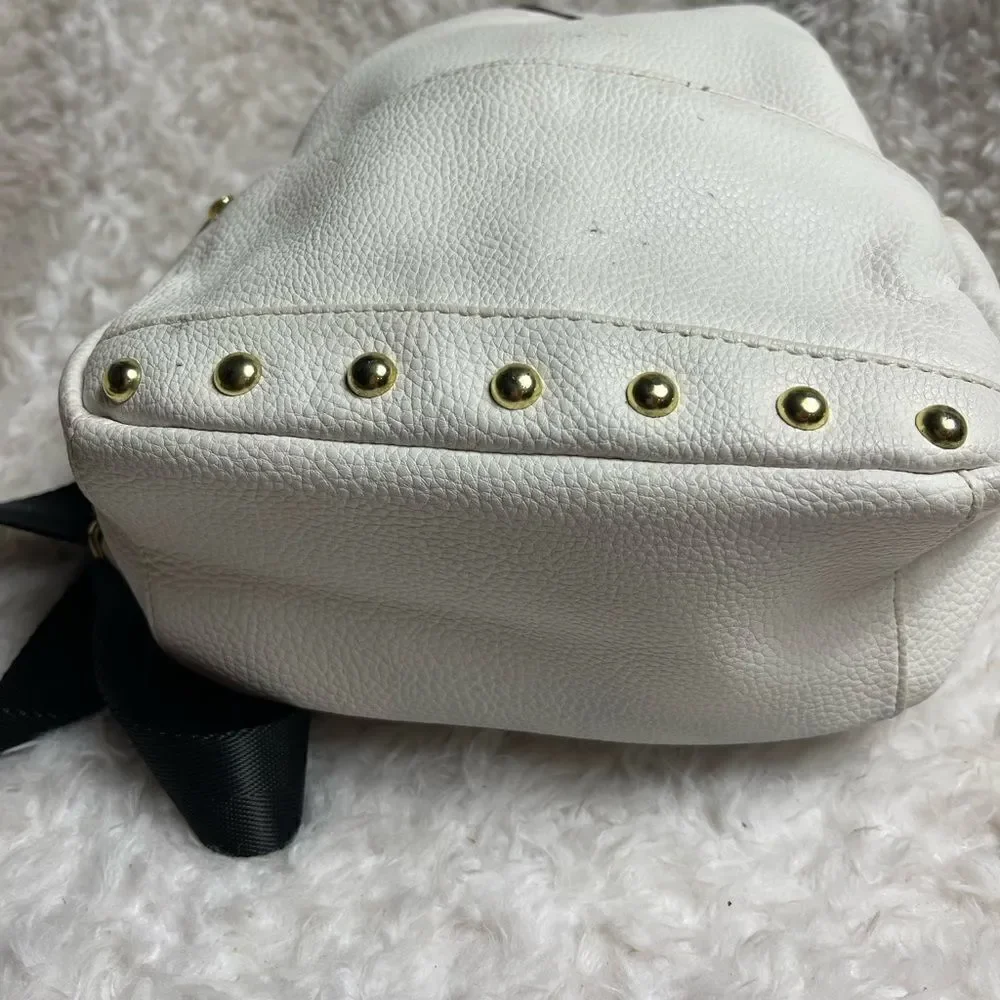 Juicy Couture white faux leather small backpack  black straps &gold tone studs